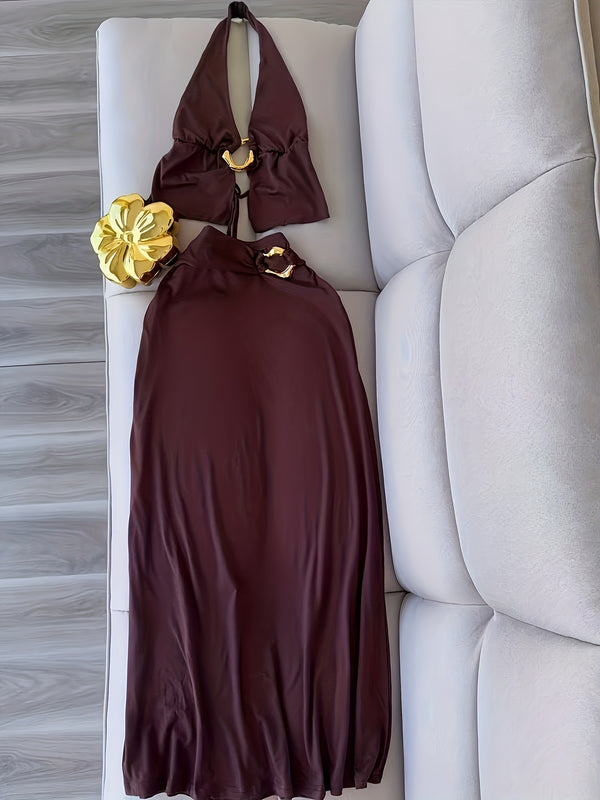 A Stylish And Sophisticated Set Featuring a Backless Halter Neck.