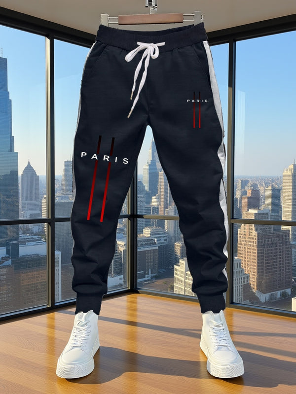 Stylish Men's Color-Blocked Jogger Pants Featuring a Striking Print Design.