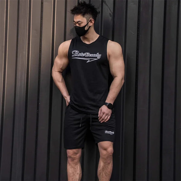 Men’s casual sport suit men running fitness vest+Shorts two-piece set.