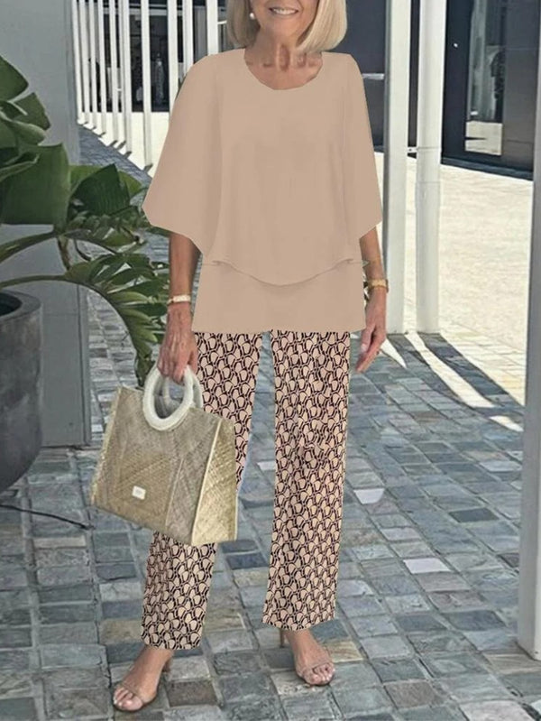 Women’s Casual Crew Neck Mid-Sleeve Top and Floral Print Pants Two-Piece.
