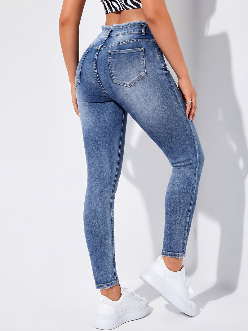 Women's Ripped Skinny Jeans with Frayed Edges.