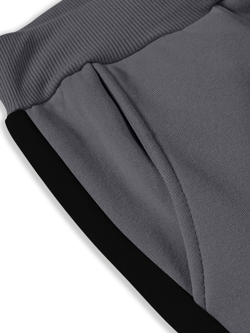 Men's Color Blocked Drawstring Sports Pants with Eye-catching Print Design.
