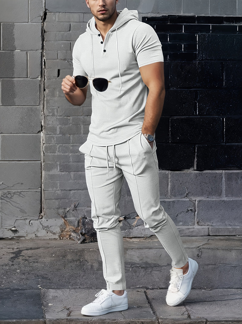 Men's set short sleeved hooded top with drawstring elastic waistband.