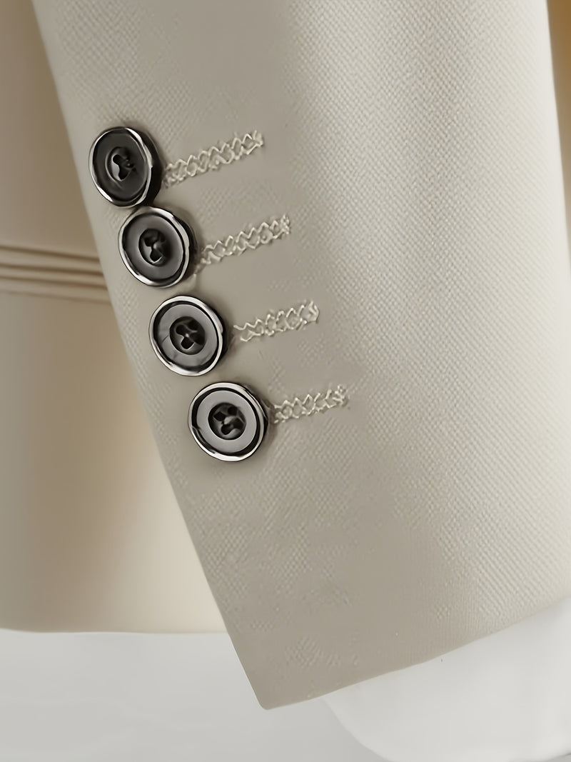 A Men's Three-Piece Suit Consisting of a Blazer, Vest, And Trousers.