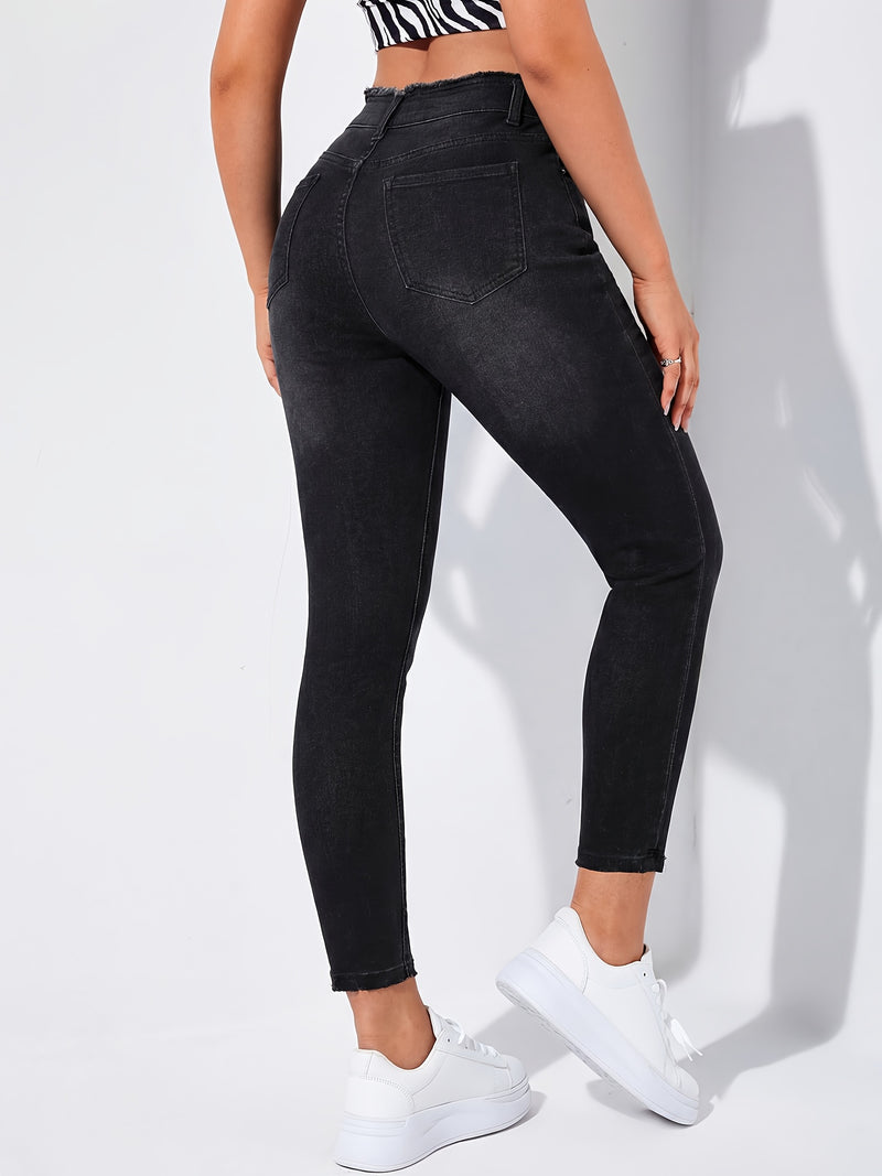 Women's Ripped Skinny Jeans with Frayed Edges.