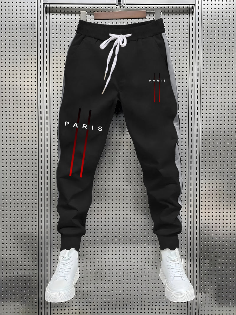Stylish Men's Color-Blocked Jogger Pants Featuring a Striking Print Design.