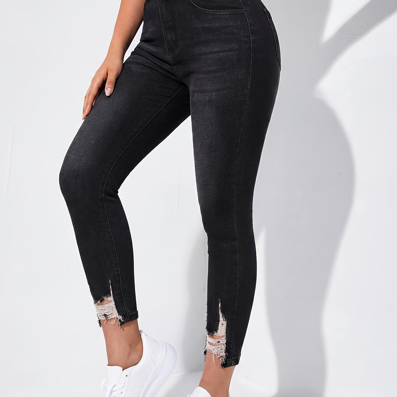 Women's Ripped Skinny Jeans with Frayed Edges.