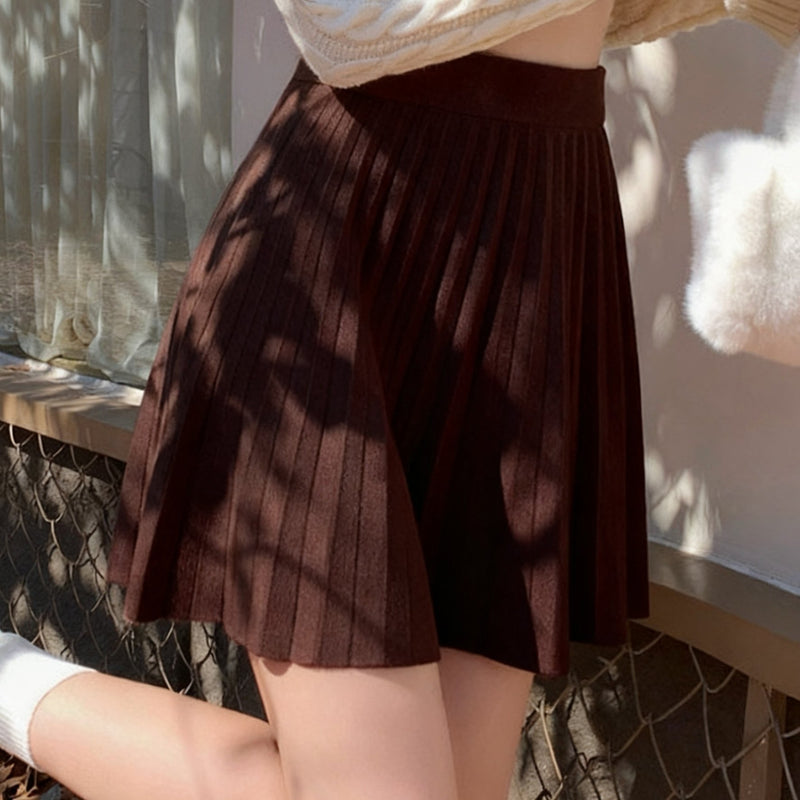 Cute And Playful High-Waisted Pleated Solid Color Mini Skirt.