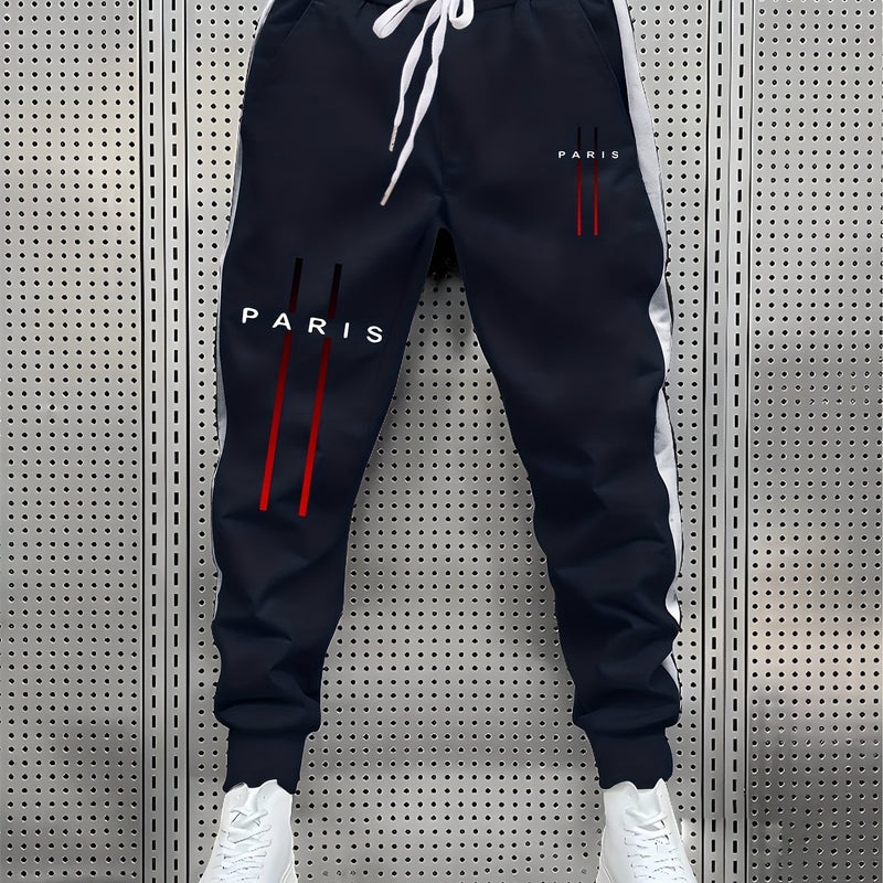 Stylish Men's Color-Blocked Jogger Pants Featuring a Striking Print Design.