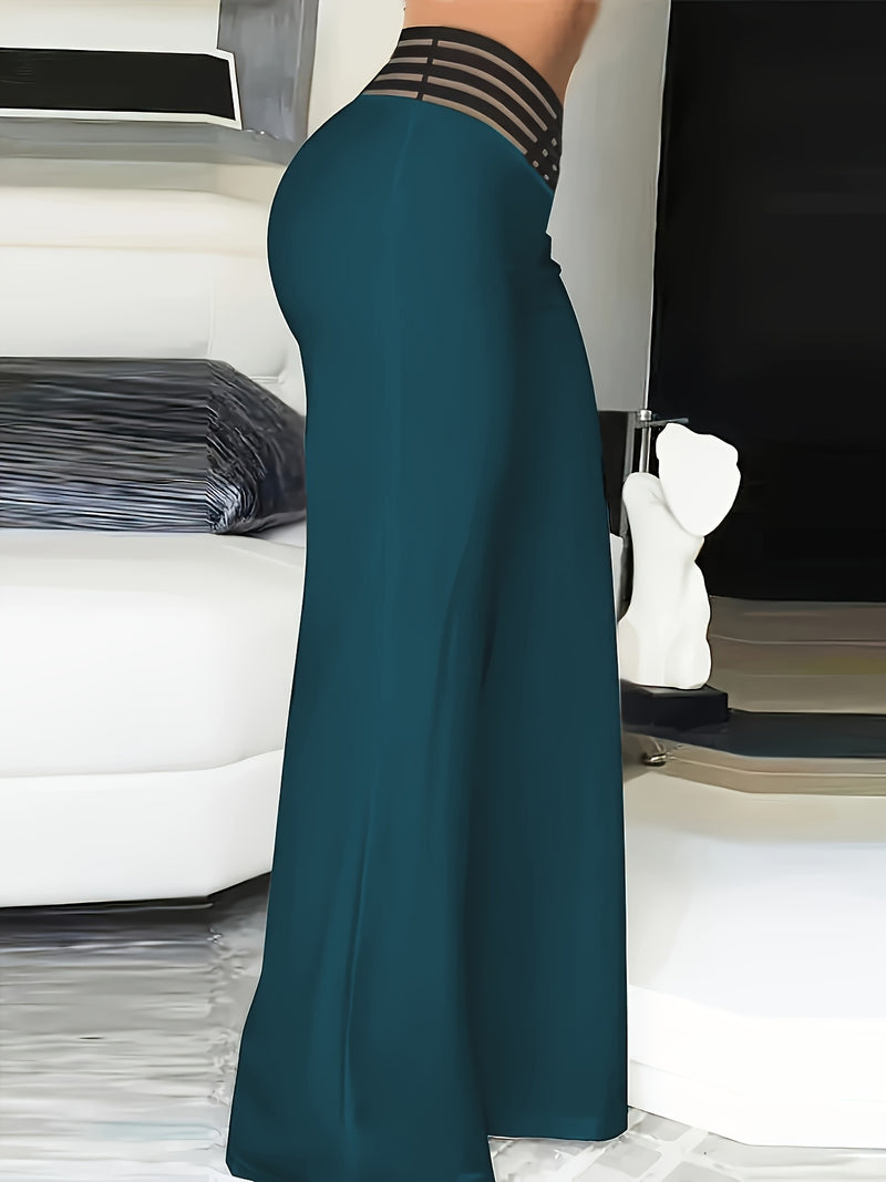 Women's High-Waist Flare Pants with Cross-Front Mesh Detail.