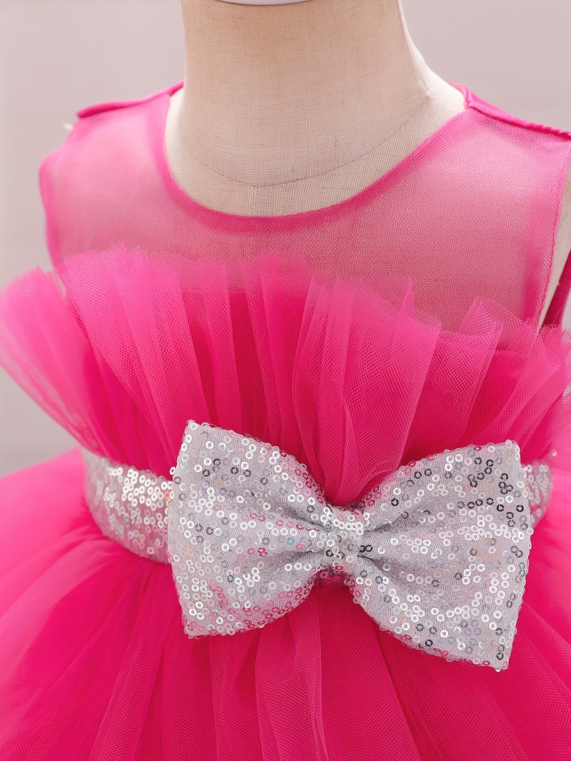 The Girl's Ethereal Puffy Dress, Perfect for a Baby's Birthday Party.