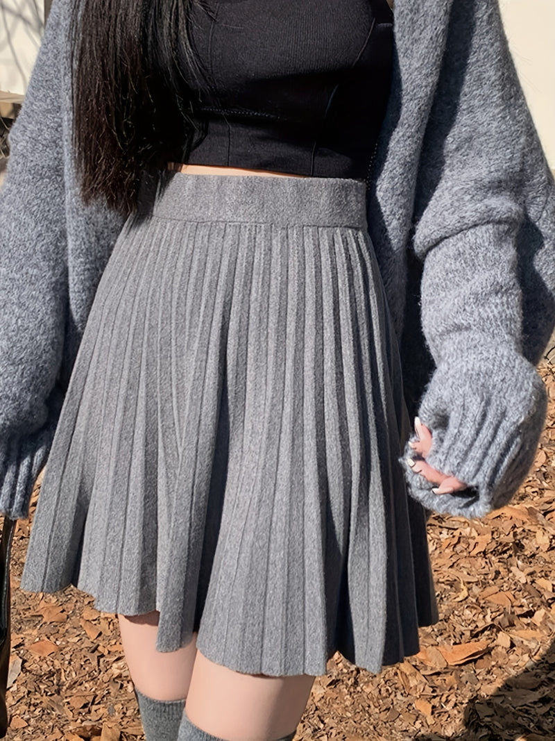 Cute And Playful High-Waisted Pleated Solid Color Mini Skirt.
