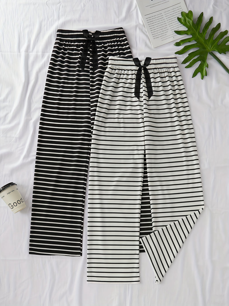 Women's Two-Piece Set Featuring a Classic Black And White Striped Theme.