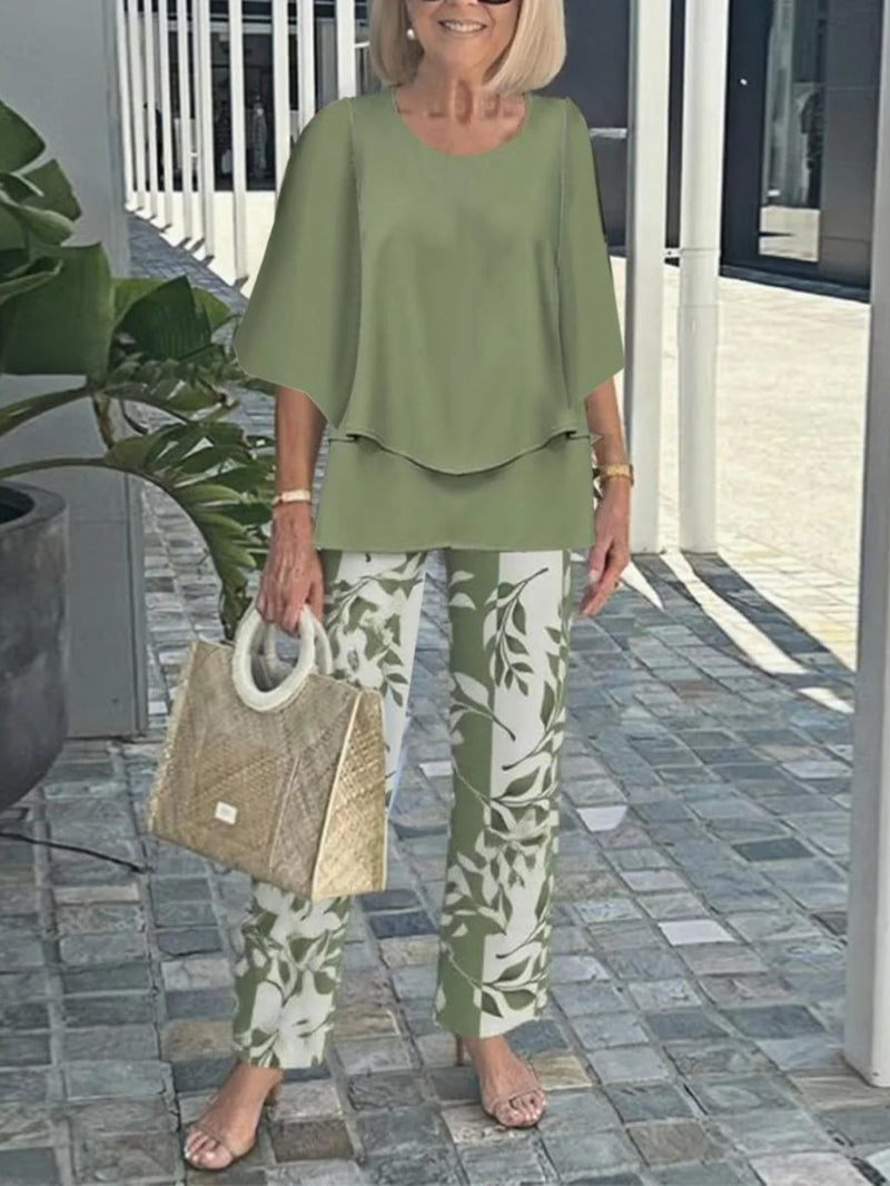 Women’s  Casual Crew Neck Mid-Sleeve Top and Floral Print Pants Two-Piece.