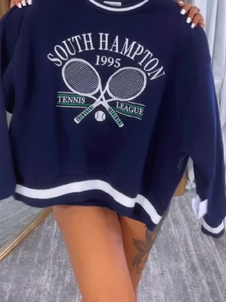 Women’s Printed Sweatshirt and Pleated Skirt Two-Piece Set.