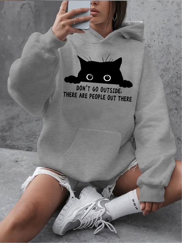 Women's Cozy Fleece Hoodie with Playful Black Cat Graphic.
