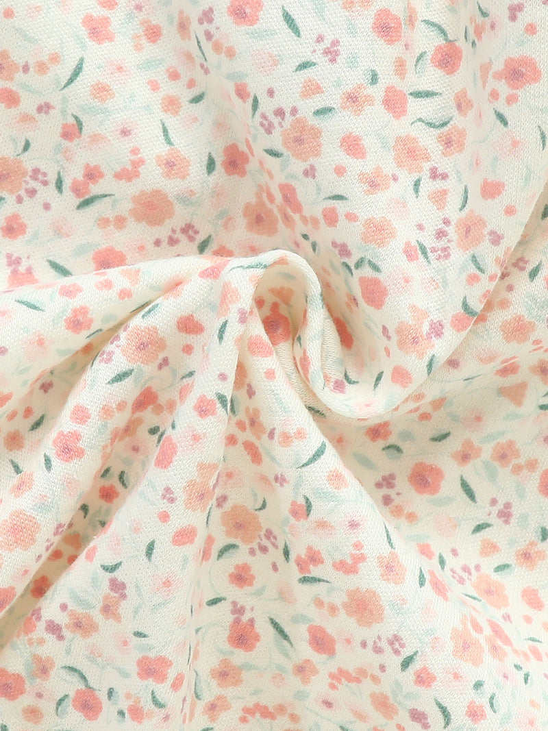 Four-Piece Infant Romper, Long-Sleeve Top, and Footed Pants Set.