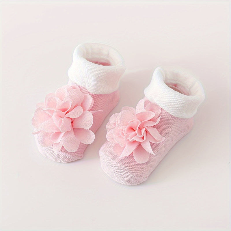 A Set of 1 Pair of Baby Flower Socks Along with a Baby Mesh Headband.