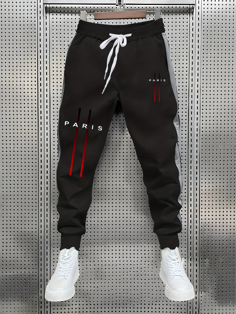 Stylish Men's Color-Blocked Jogger Pants Featuring a Striking Print Design.