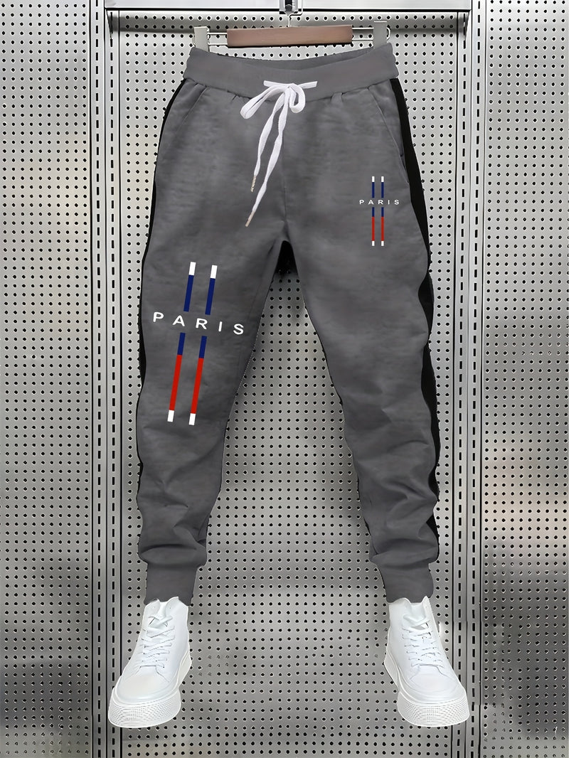 fashionable Men's color blocked drawstring sports pants.