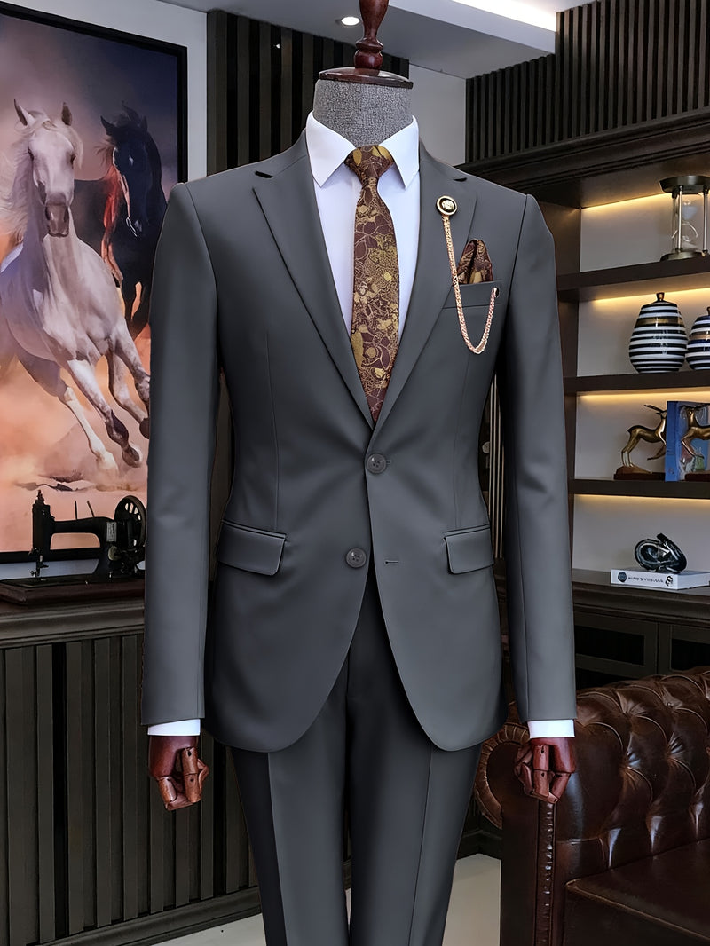 A Men'S Two-Piece Suit Featuring a Easy And Stylish Design.