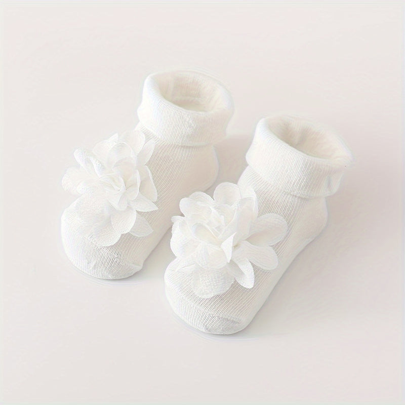 A Set of 1 Pair of Baby Flower Socks Along with a Baby Mesh Headband.