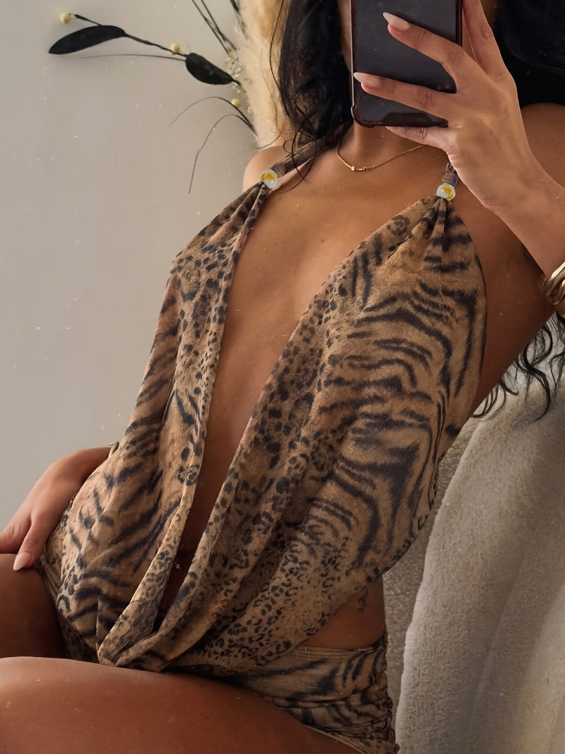 Sexy Leopard Print Backless Halter Neck Top and Tight Shorts Set for Women.
