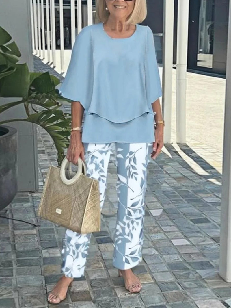 Women’s  Casual Crew Neck Mid-Sleeve Top and Floral Print Pants Two-Piece.