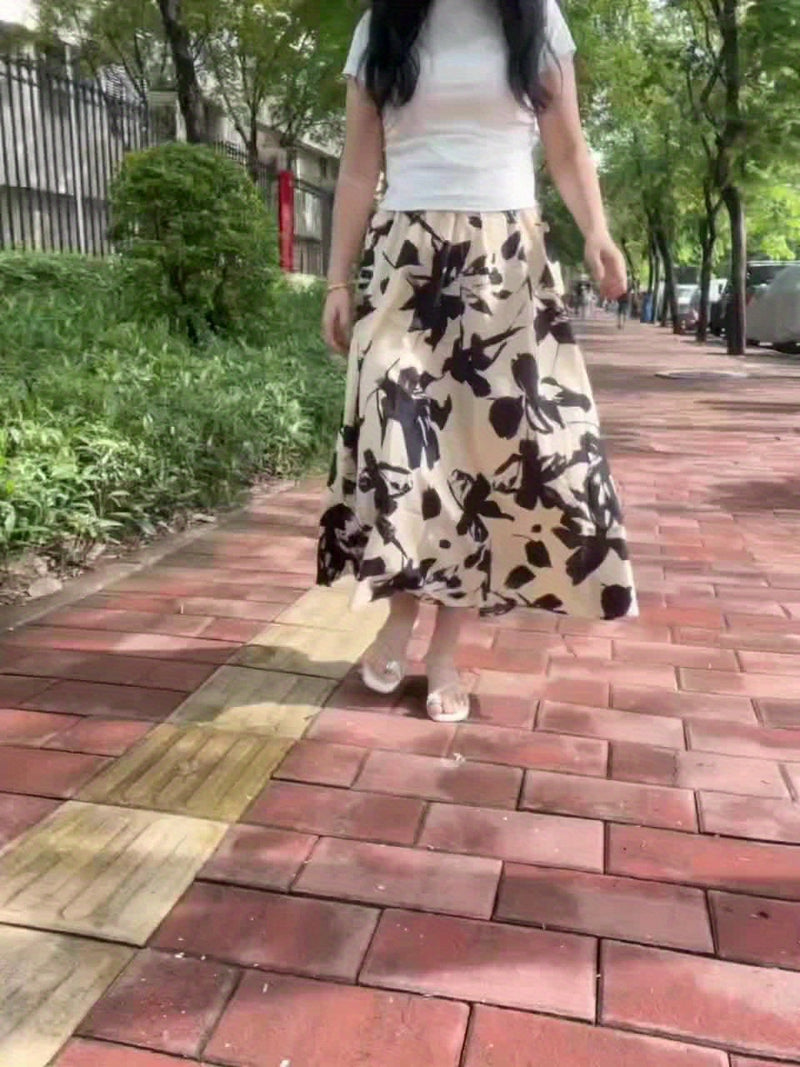 A High-Waisted Skirt with a Floral Pattern for Women.