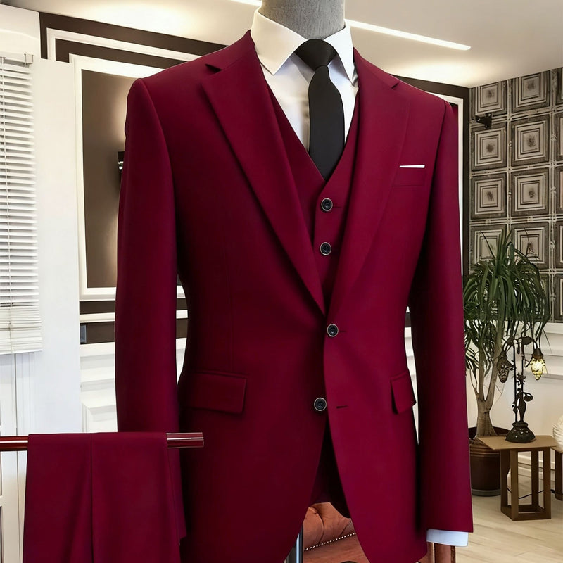 A Men's Three-Piece Suit Consisting of a Blazer.