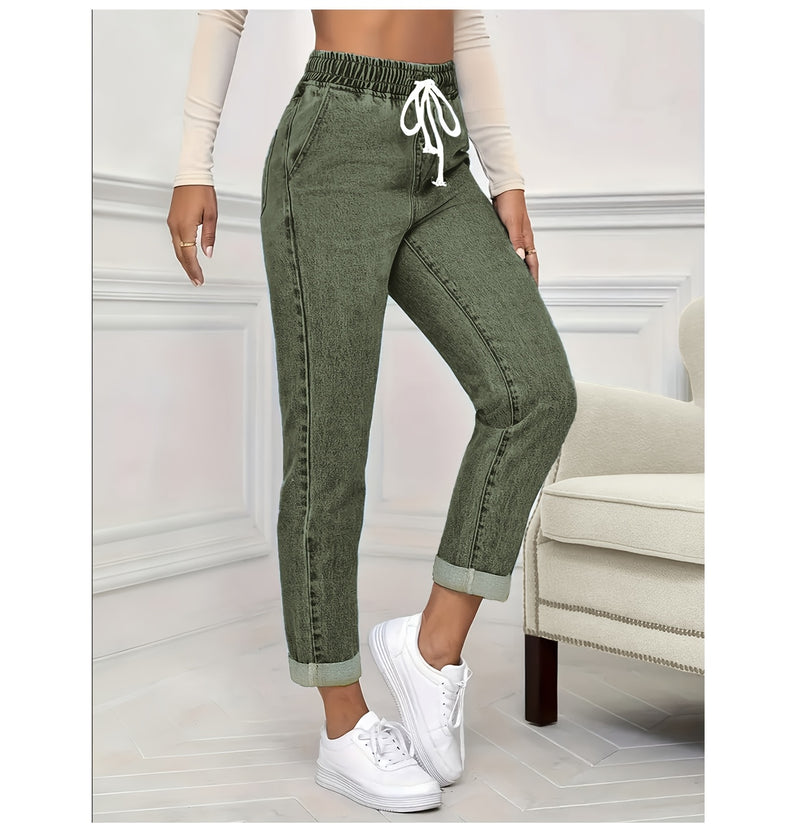 Women's stretch elastic waist drawstring slim fit jeans.