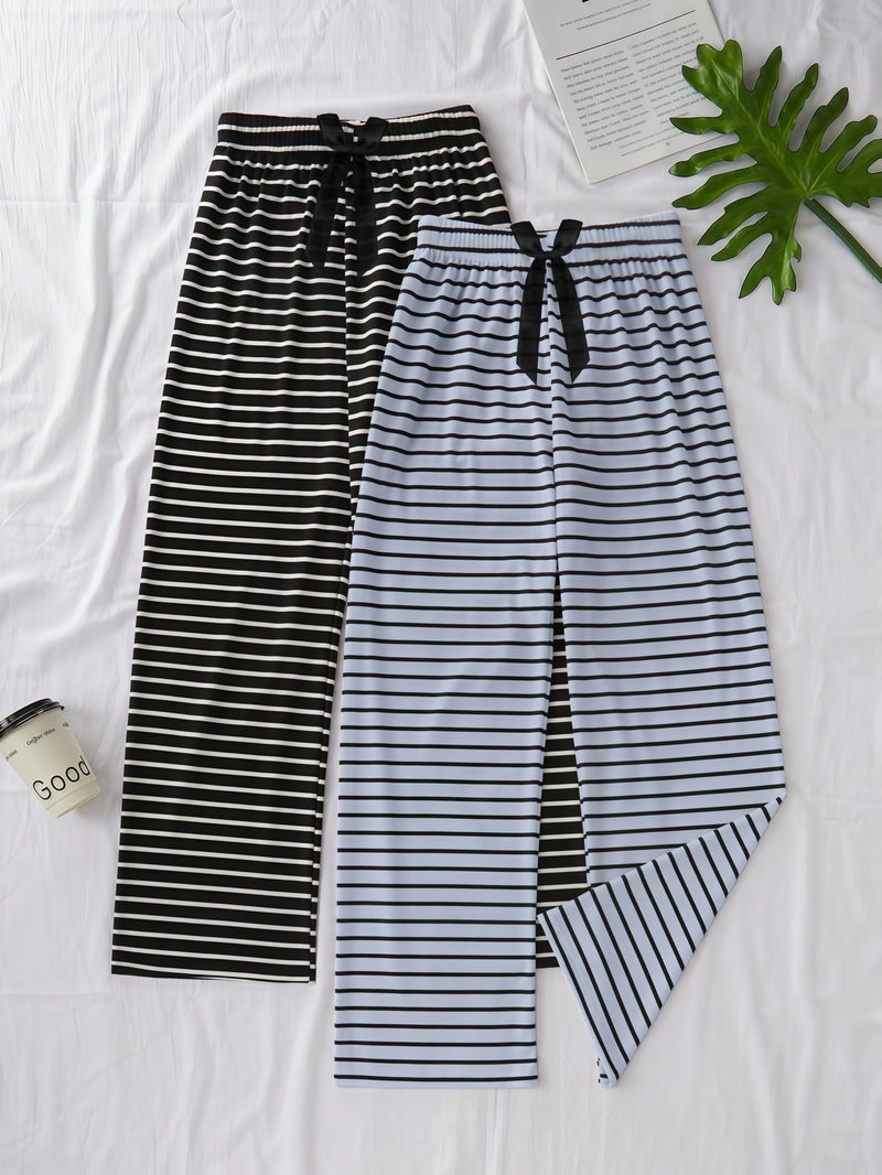 Women's Two-Piece Set Featuring a Classic Black And White Striped Theme.