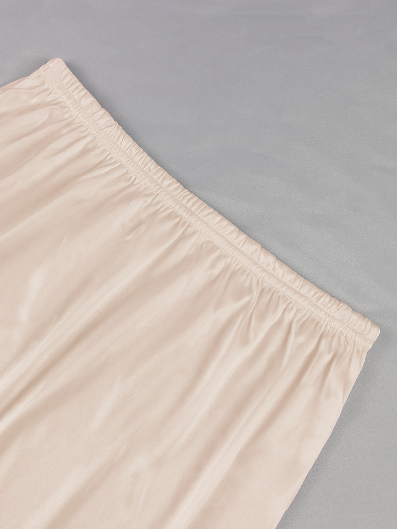 Women's Two-Piece Set Featuring an Exquisite Lace-Trimmed Skirt.