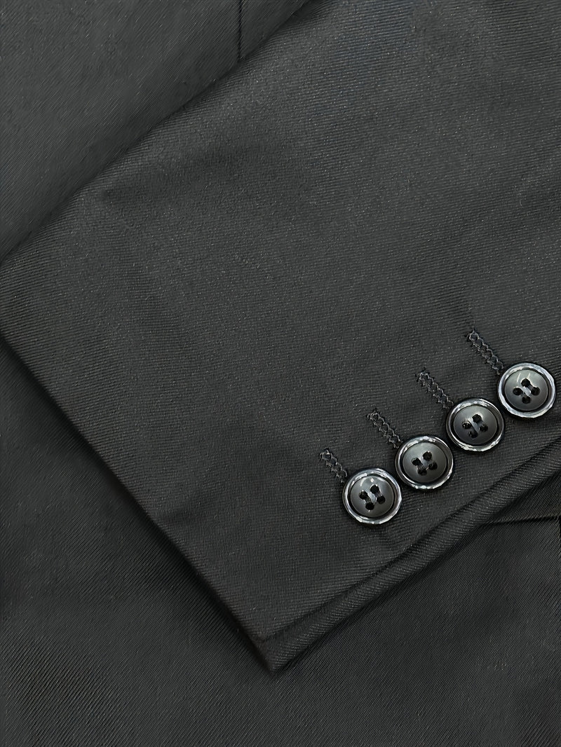 A Men'S Two-Piece Suit Featuring a Easy And Stylish Design.
