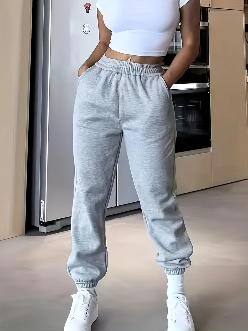 High-Waisted Elastic Jogger Pants for Women - 100% Polyester Casual Style.
