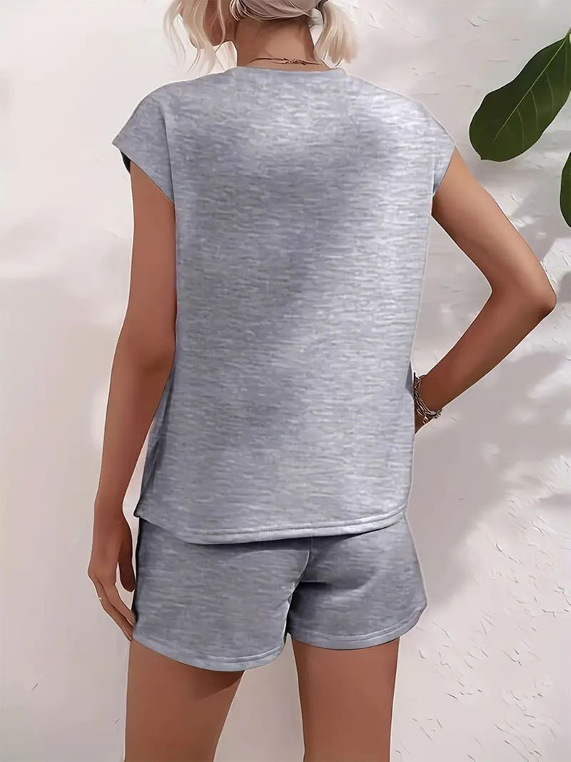 Women's Casual Sleeping Dinosaur Graphic Tee and Shorts.