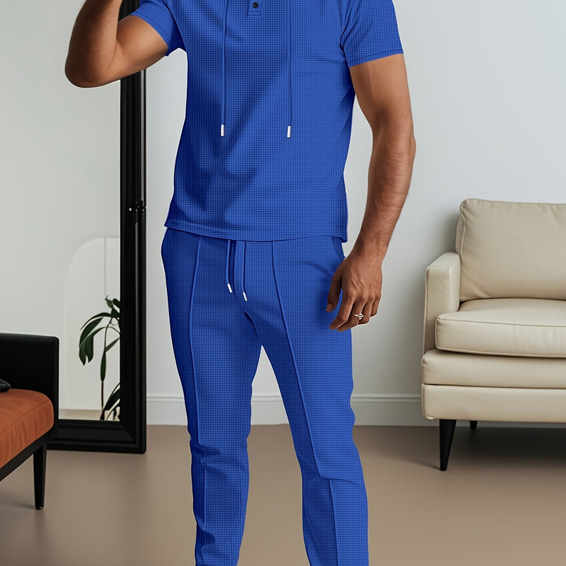 Men's set short sleeved hooded top with drawstring elastic waistband.