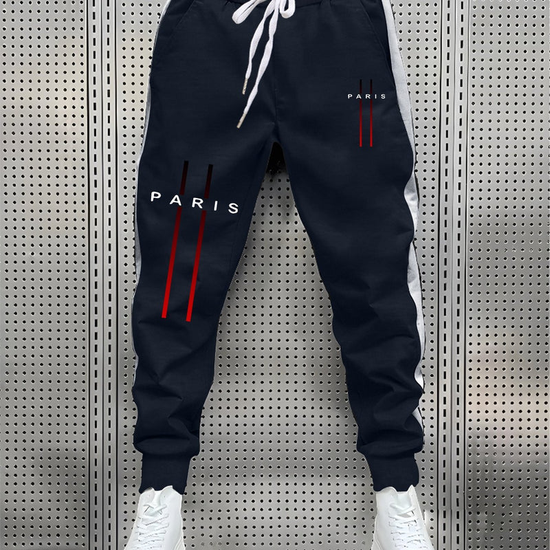 Stylish Men's Color-Blocked Jogger Pants Featuring a Striking Print Design.