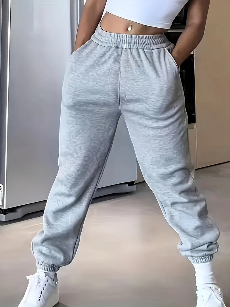 High-Waisted Elastic Jogger Pants for Women - 100% Polyester Casual Style.