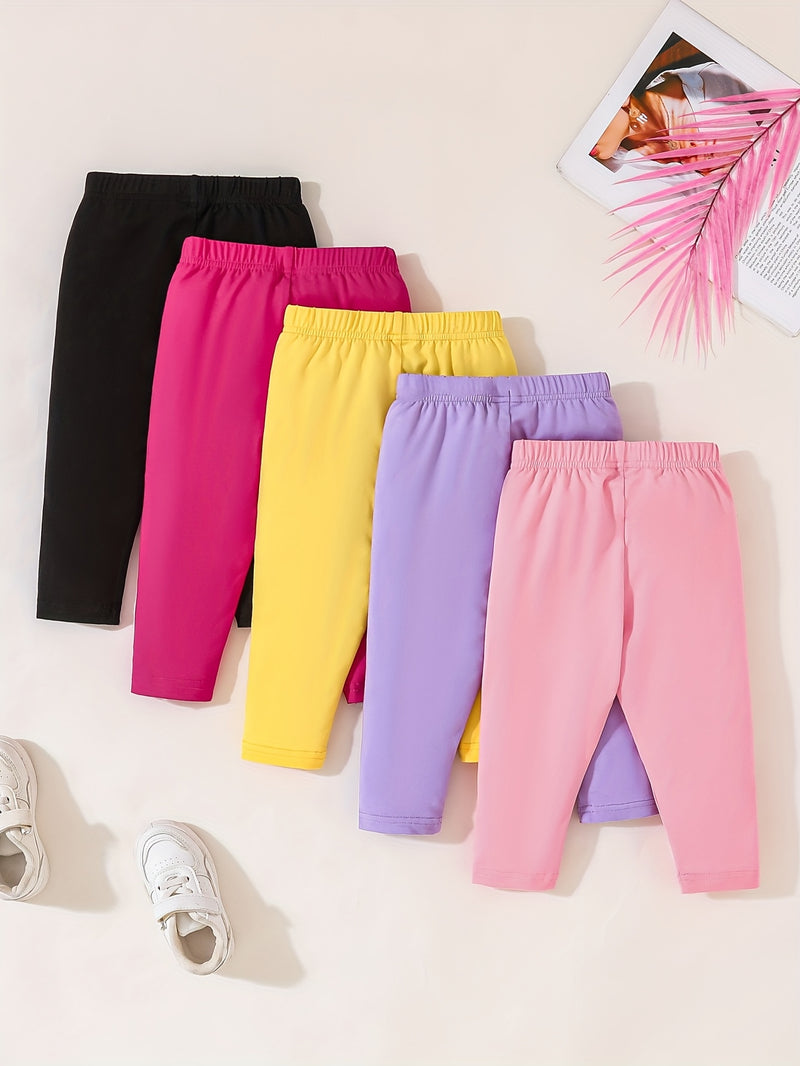 A Set of Five Adorable Hello Kitty Leggings with Bow Prints from Sanrio.