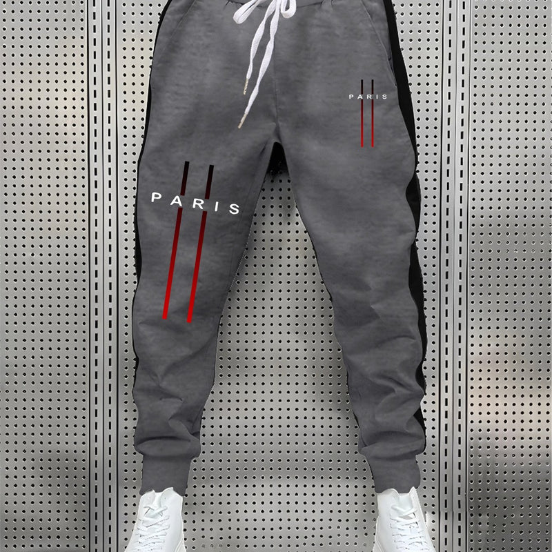 Stylish Men's Color-Blocked Jogger Pants Featuring a Striking Print Design.