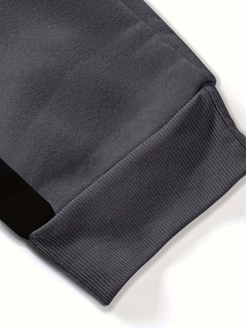 Men's Color Blocked Drawstring Sports Pants with Eye-catching Print Design.