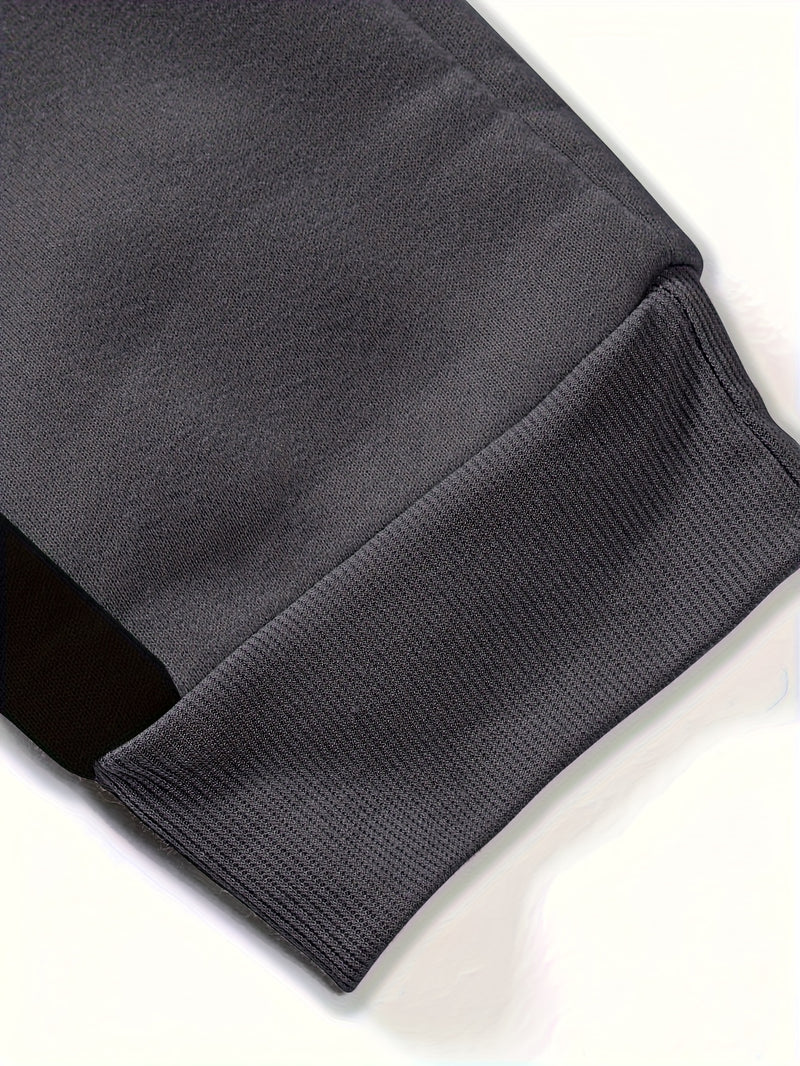 fashionable Men's color blocked drawstring sports pants.