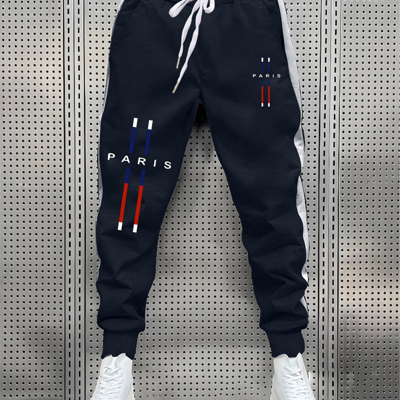 fashionable Men's color blocked drawstring sports pants.