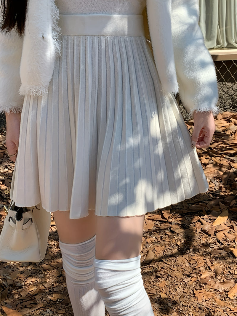Cute And Playful High-Waisted Pleated Solid Color Mini Skirt.