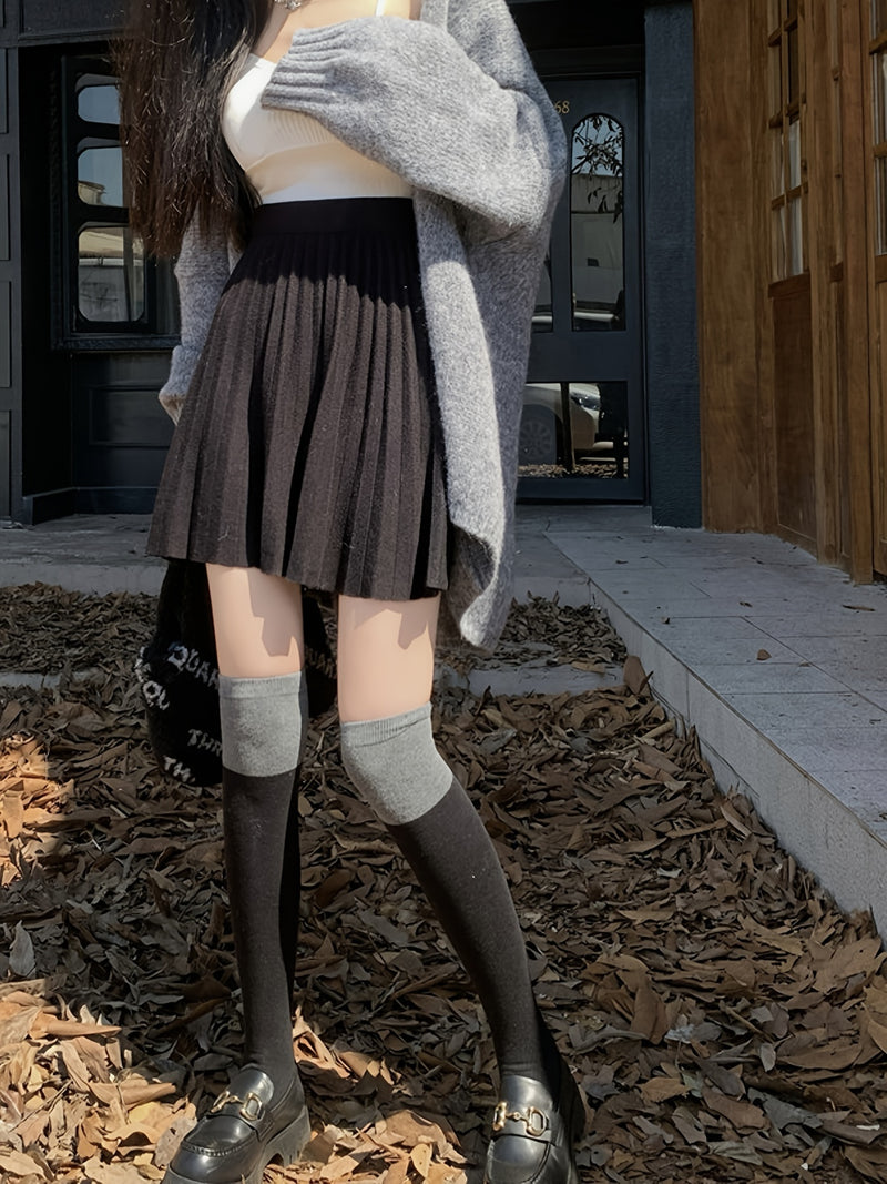 Cute And Playful High-Waisted Pleated Solid Color Mini Skirt.