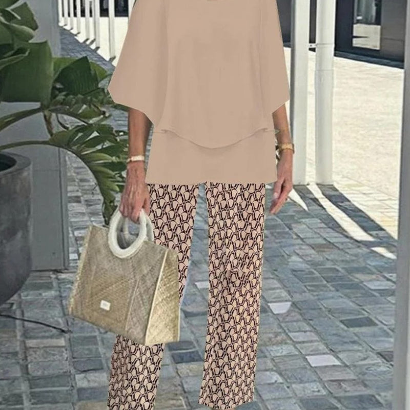 Women’s  Casual Crew Neck Mid-Sleeve Top and Floral Print Pants Two-Piece.