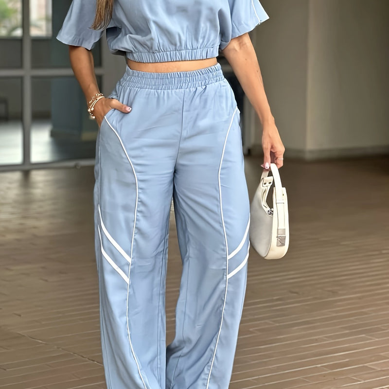 Women’s Trendy Crop Top Paired with Wide-Leg Pants.