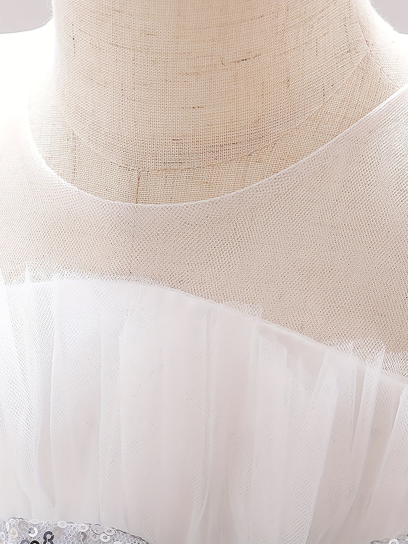 The Girl's Ethereal Puffy Dress, Perfect for a Baby's Birthday Party.