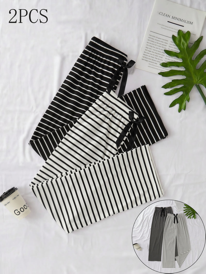 Women's Two-Piece Set Featuring a Classic Black And White Striped Theme.